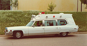 1973 Superior 54-inch headroom ambulance white L side
